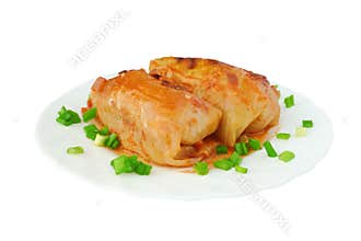 Cabbage rolls in tomato sauce on plate