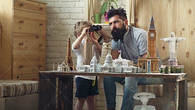 Father and son in search of adventure. Adventure begin right now. Discovering new places. Little child and man with