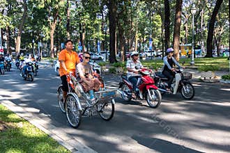 Cyclo in Ho Chi Minh City Street