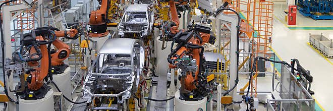 Welding of car body. Automotive production line. long format. Wide frame