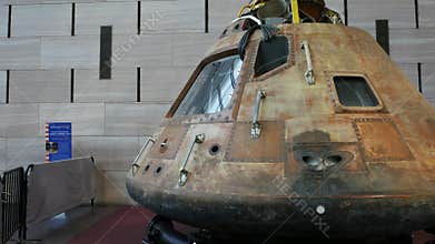 Gimbal shot walking around the apollo 11 command module