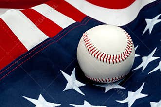A baseball on the American flag