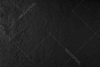 Black stone background, grey cement texture. Top view, flat lay.