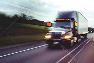 Semi truck on highway concept with motion blur
