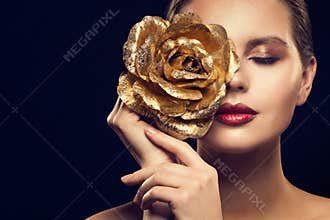 Fashion Model Beauty Portrait with Gold Rose Flower, Golden Woman Luxury Makeup an Rose Jewelry