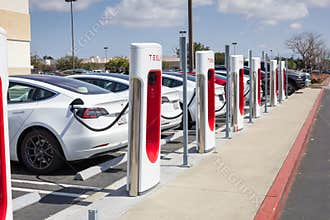 Tesla charging station pumps