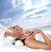 A young woman is getting spa treatment