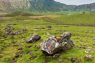 Volcanic crater Caldeirao with a beautiful lake on the top of Corvo island. Azores islands, Portugal