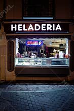 Ice cream shop window at night