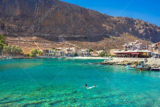 Old warehouses in the small port of Gerolimenas village, Mani region, Lakonia, Peloponnese, Greece