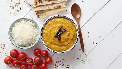 Indian popular food Dal fry or traditional Dal Tadka Curry served in bowl