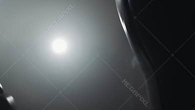 Woman`s hand in boxing gloves punching a bag in a boxing club. Close up, slow motion