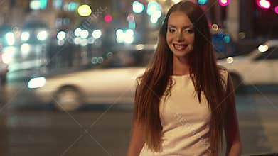 Vintage footage of bachelorette in light dress in the night city