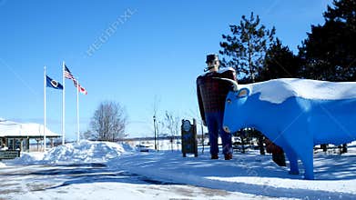 BEMIDJI, MN - 8 FEB 2019: Statue of Paul Bunyan and Babe the Blue Ox, Legendary Lumberjack and popular landmark.
