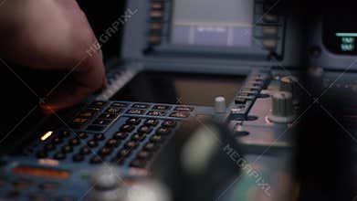 Panel of switches on an aircraft flight deck. Autopilot control element of an airliner. Pilot controls the aircraft