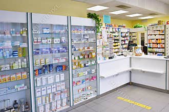 May 2, 2016 Brno Czech Republic. Interior of a pharmacy with goods and showcases. Medicines and vitamins for health. Shop concept,