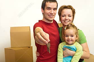 Family with the keys of their new home