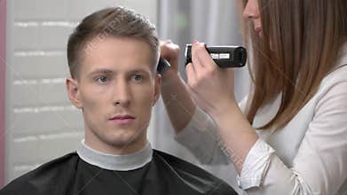 Man getting a haircut.