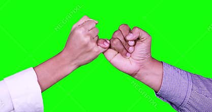 Hands making a pinkie promise