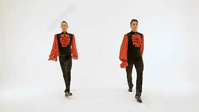 Two men in black suits dancing on a white background.