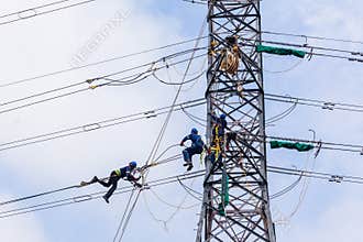 Electricians Hanging Tower Power Lines