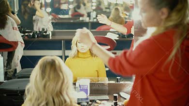 Backstage of working make up artist.