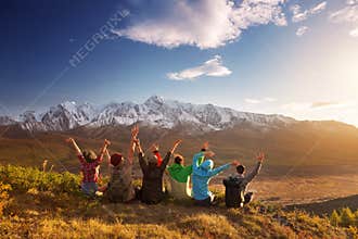 Group happy friends having fun mountain top