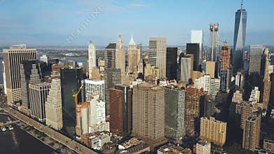 Aerial view of the Manhattan district in New York, America. Drone flying over the busy city near the East river.
