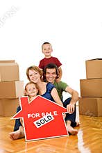 Happy family moving into a new home