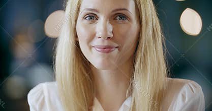 Blonde woman smiling to camera portrait.Corporate business team work office meeting.Caucasian businessman and