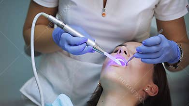 Dental restoration and material polymerization with UV light.
