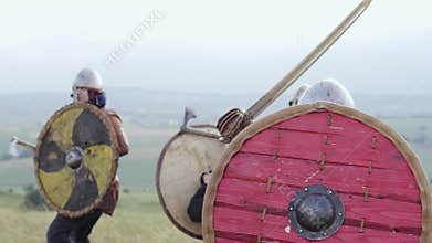 Medieval Warriors of Vikings are fighting during attack .