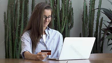 Businesswoman buy tickets with laptop computer