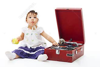 Adorable Toddler girl with gramophone