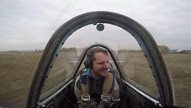 Extreme flight on a small sports plane. A man flies in the sky, emotions