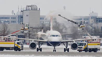 Airplane at deice pad, defrosting, Munich Airport