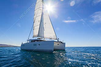 Sailing catamaran sail the Aegean sea