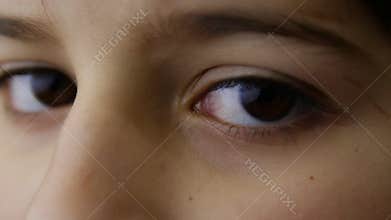 Brown eyes of young boy