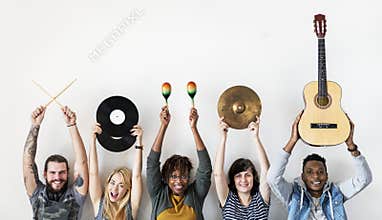 People together holding music instruments together