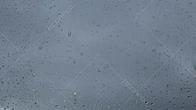 A window that is pouring rain