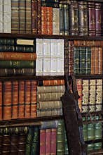 Old classic books on bookshelf