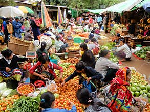 Myanmar, Colorful food market with fruits, vegetables and local population