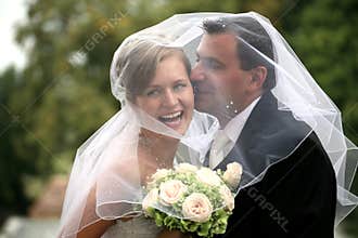 Wedding couple kissing