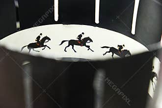 A zoetrope is film animation devices that produce the illusion of motion by displaying motion of drawings. Illustrative photo