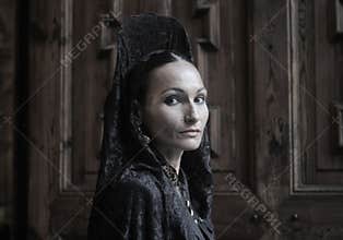 A Manola wearing traditional Mantilla