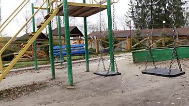 Swing swaying in a empty park