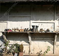 Shoes drying outside village house