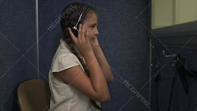 Little girl undergoes a hearing test
