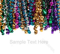 Mardi gras beads on white with copy space