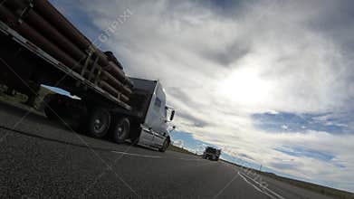 Flatbed semi truck pass